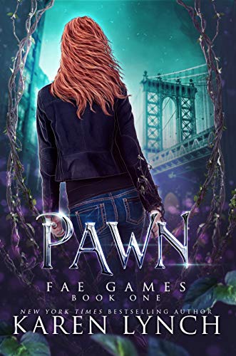 A woman standing in front of a bridge with the word pawn written on it.